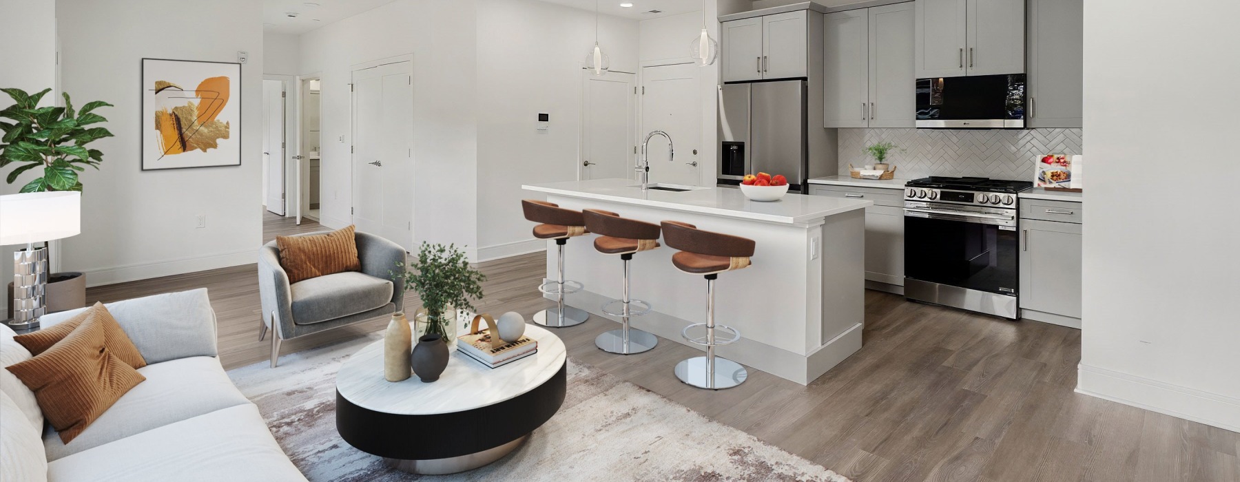 a living room and kitchen with modern decor
