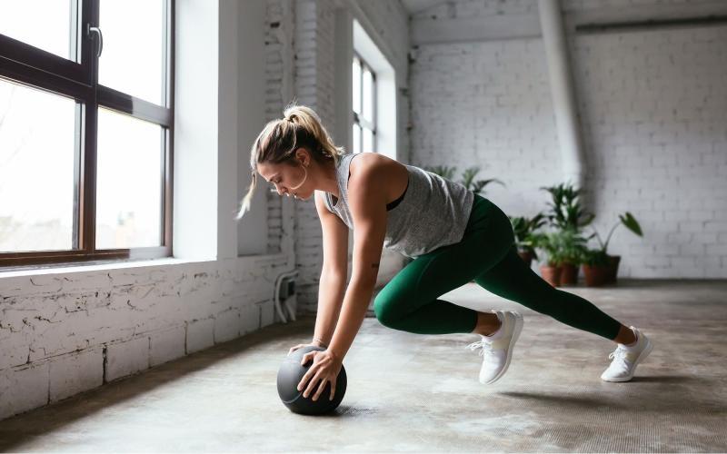 a person working out with a ball