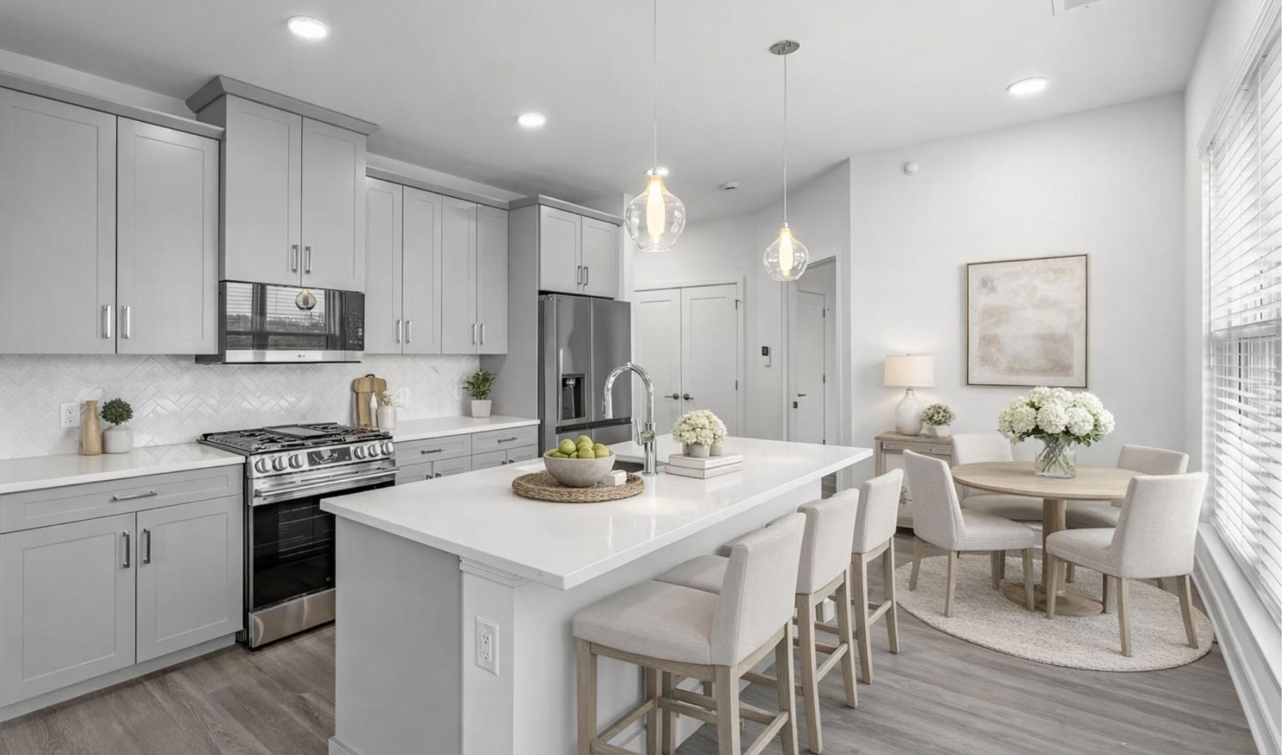 a kitchen with white cabinets