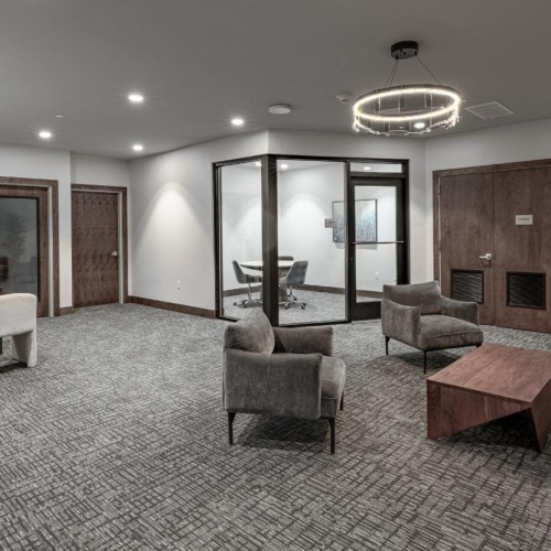 a large living room with a large glass door